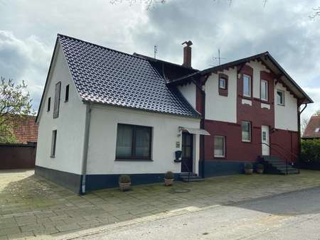 Straßenansicht - Zweifamilienhaus in 27404 Gyhum mit 200m² kaufen