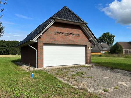 Garage Straßenansicht - Einfamilienhaus in 27389 Lauenbrück mit 151m² kaufen