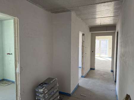 Beispiel Flur Haus 1 (Aktueller Bautenstand: 12.04.25) - Etagenwohnung in 27383 Scheeßel mit 72m² kaufen