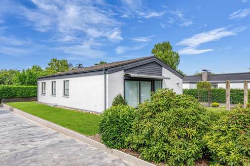 Seitenansicht Seitenansicht - Einfamilienhaus in 28832 Achim mit 110m² kaufen
