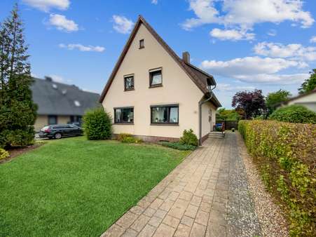 Hofeinfahrt - Einfamilienhaus in 28832 Achim mit 125m² günstig kaufen