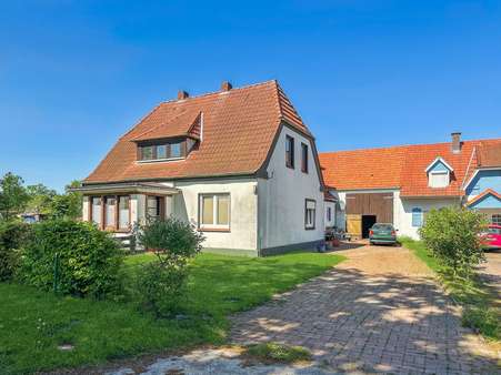 Straßenansicht und Hofeinfahrt - Einfamilienhaus in 27321 Emtinghausen mit 110m² kaufen