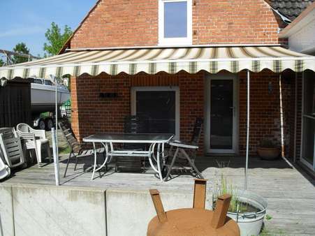 Terrasse am Wintergarten begehbar - Zweifamilienhaus in 27299 Langwedel mit 295m² kaufen