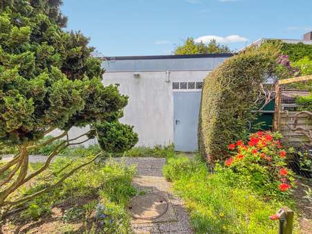 Seiteneingang zur Garage - Einfamilienhaus in 28832 Achim mit 100m² kaufen