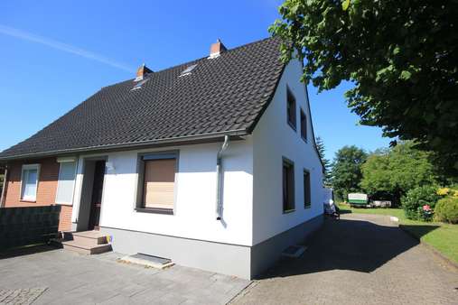 Straßenansicht Straßenansicht - Doppelhaushälfte in 27283 Verden mit 73m² kaufen
