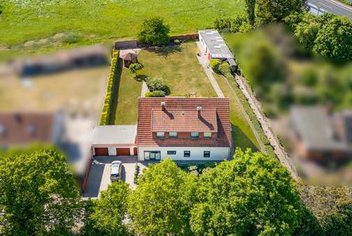 Luftbild - Straßenansicht - Einfamilienhaus in 28876 Oyten mit 271m² kaufen