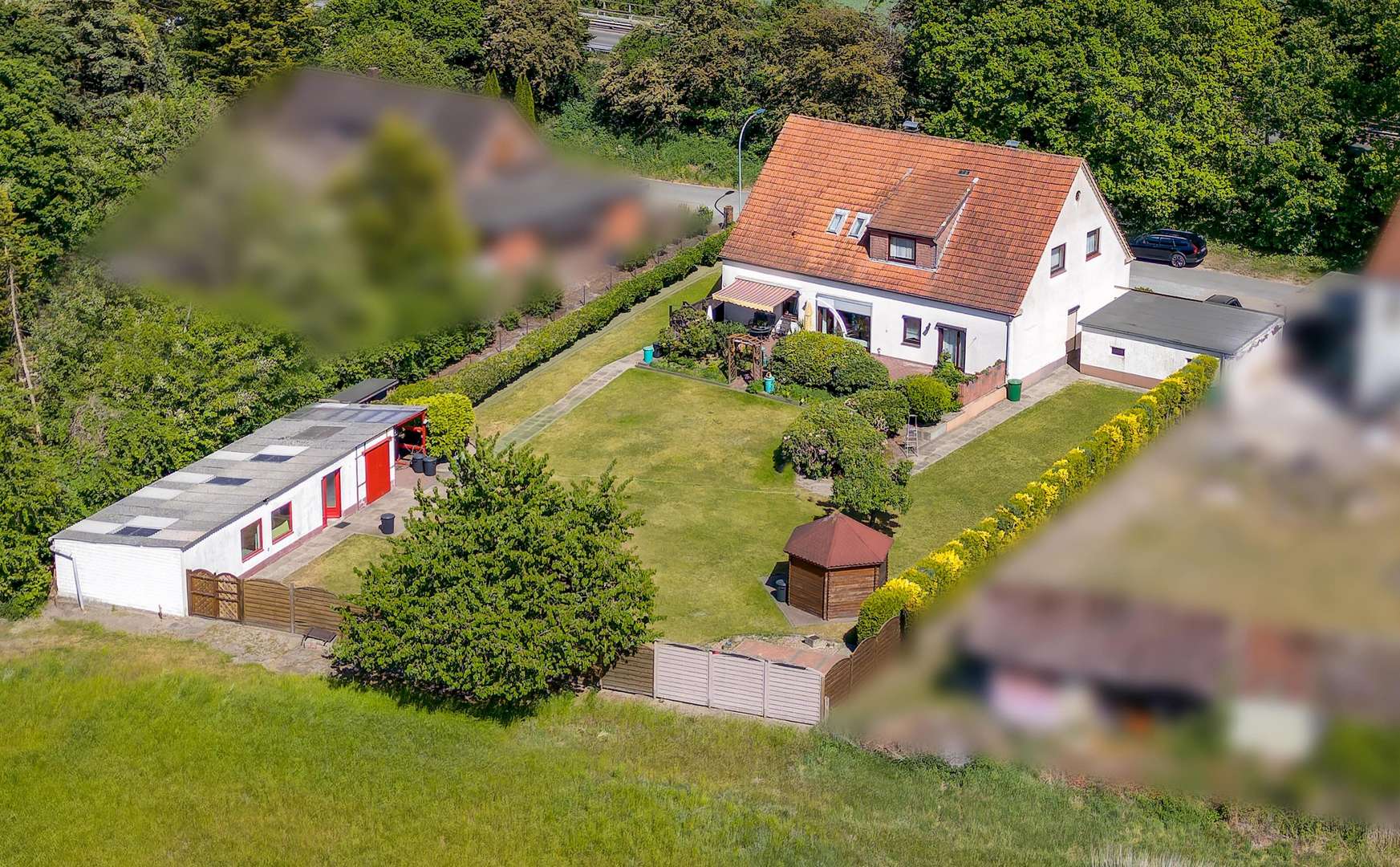 Luftbild Gartenseite - Einfamilienhaus in 28876 Oyten mit 271m² kaufen