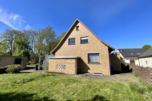 Gartenansicht - Einfamilienhaus in 27619 Schiffdorf mit 151m² kaufen