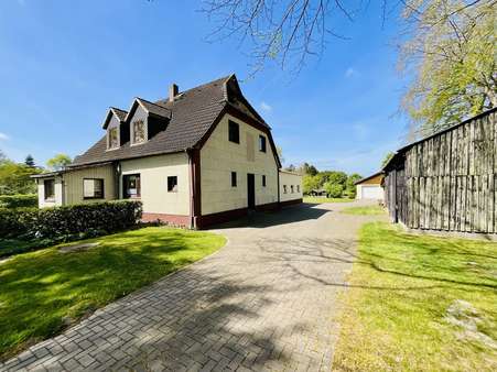 Seitenansicht - Einfamilienhaus in 27612 Loxstedt mit 195m² kaufen