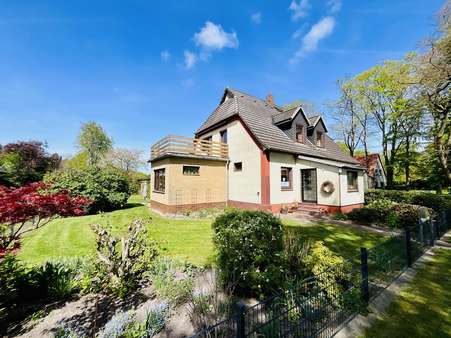 Seitenansicht - Einfamilienhaus in 27612 Loxstedt mit 195m² kaufen
