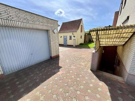 Garage und Kellerzugang - Einfamilienhaus in 27607 Geestland mit 104m² kaufen