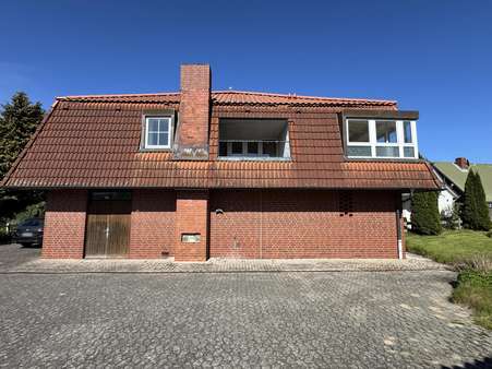 Rückansicht Rückansicht - Zweifamilienhaus in 21762 Osterbruch mit 120m² kaufen