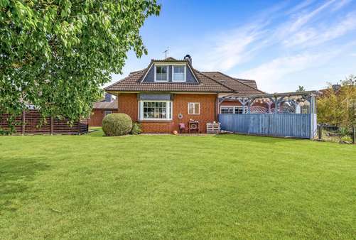 Seitenansicht - Einfamilienhaus in 21712 Großenwörden mit 207m² kaufen