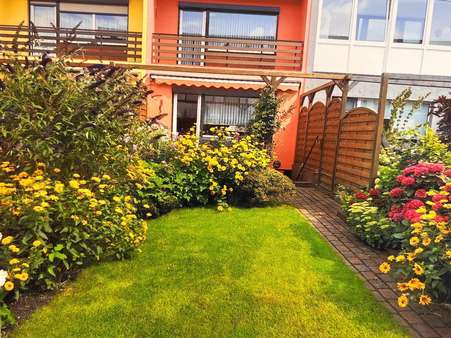 Gartenansicht - Reihenmittelhaus in 27607 Geestland mit 120m² kaufen