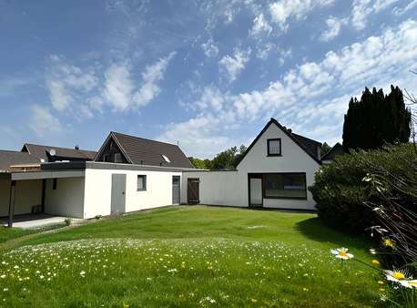 Gartenansicht - Einfamilienhaus in 27572 Bremerhaven mit 110m² kaufen