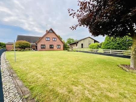Gartenansicht Gartenansicht - Einfamilienhaus in 27628 Hagen mit 163m² kaufen