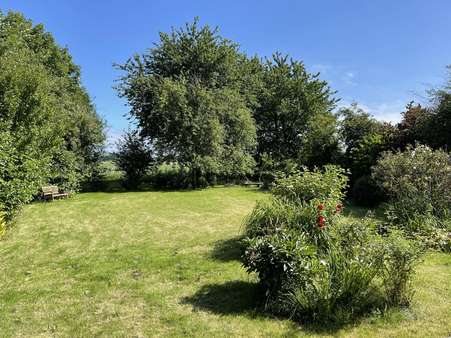 Blick in den Garten - Einfamilienhaus in 27639 Wurster Nordseeküste mit 157m² kaufen