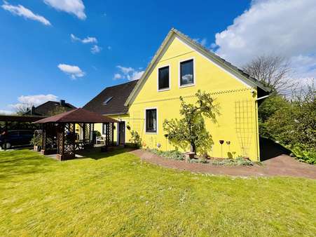 Gartenansicht - Einfamilienhaus in 27612 Loxstedt mit 216m² kaufen