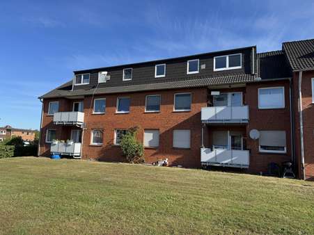 Gartenansicht - Dachgeschosswohnung in 27639 Wurster Nordseeküste mit 76m² kaufen