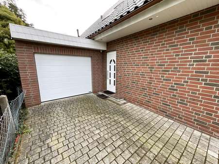 Eingangsbereich mit Garage - Einfamilienhaus in 27607 Geestland mit 122m² kaufen