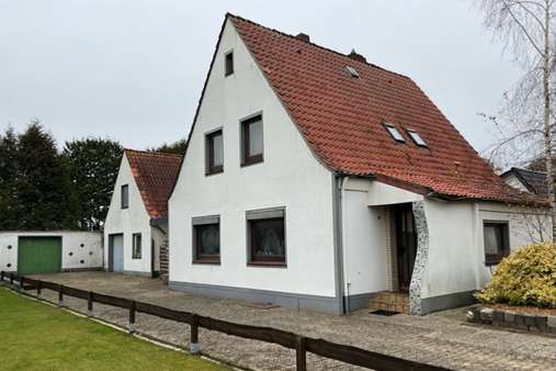 Straßenansicht - Einfamilienhaus in 27639 Wurster Nordseeküste mit 104m² kaufen
