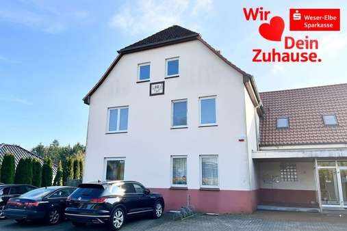 Vorderansicht - Etagenwohnung in 27619 Schiffdorf mit 102m² kaufen