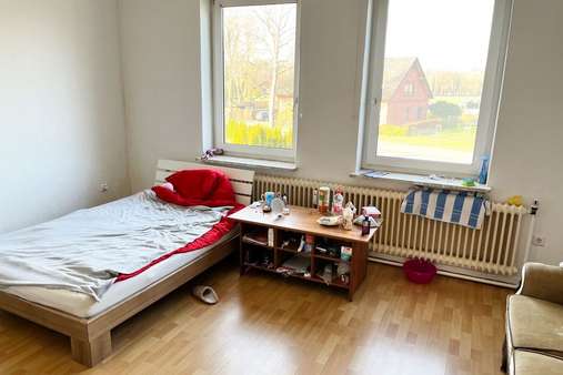 Schlafzimmer - Etagenwohnung in 27619 Schiffdorf mit 102m² günstig kaufen