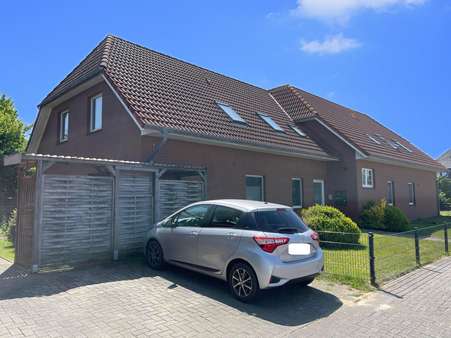 Seitenansicht - Erdgeschosswohnung in 27639 Wurster Nordseeküste mit 90m² kaufen