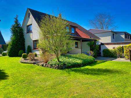 Gartenansicht - Einfamilienhaus in 27612 Loxstedt mit 140m² kaufen