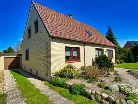 Seitenansicht - Einfamilienhaus in 27612 Loxstedt mit 140m² kaufen