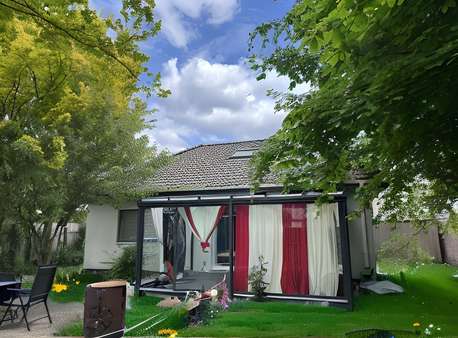 Gartenansicht - Einfamilienhaus in 27572 Bremerhaven mit 89m² kaufen