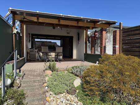 Überdachte Terrasse - Bungalow in 27639 Wurster Nordseeküste mit 81m² kaufen