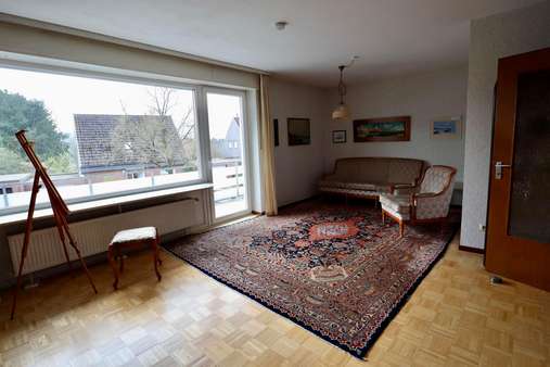 Wohnzimmer - Doppelhaushälfte in 40882 Ratingen mit 133m² kaufen