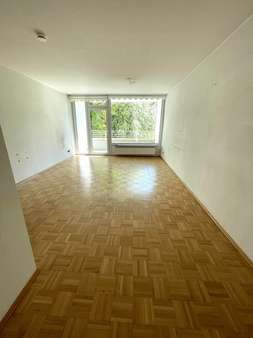Wohnzimmer - Erdgeschosswohnung in 40595 Düsseldorf mit 82m² kaufen