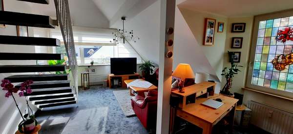 Wohnbereich - Maisonette-Wohnung in 40625 Düsseldorf mit 107m² günstig kaufen