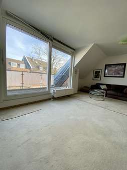 Wohnzimmer - Maisonette-Wohnung in 40221 Düsseldorf mit 70m² kaufen