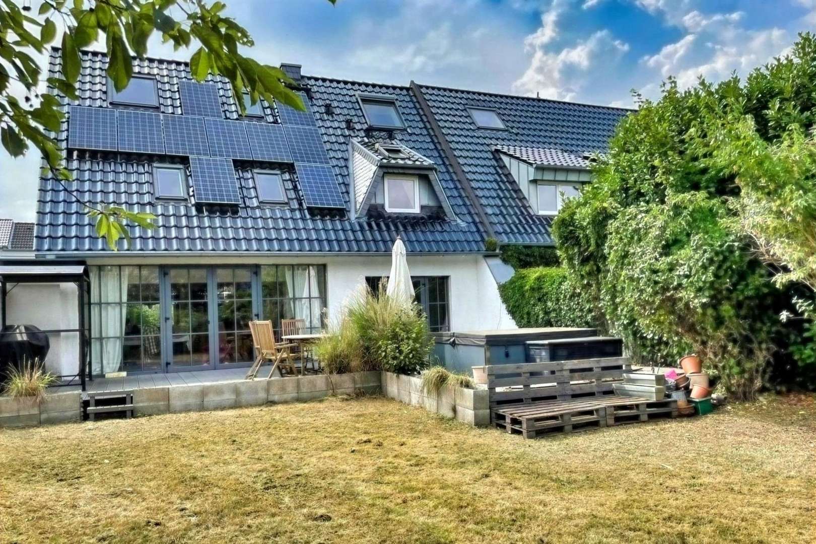 Gartenansicht - Doppelhaushälfte in 40764 Langenfeld mit 130m² kaufen