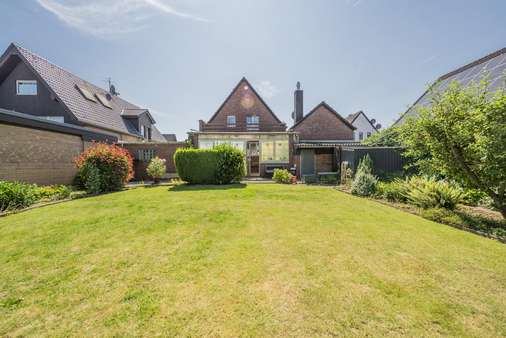 Hausrückseite - Einfamilienhaus in 41516 Grevenbroich mit 92m² kaufen