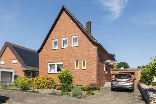 Straßenansicht - Einfamilienhaus in 41516 Grevenbroich mit 92m² kaufen