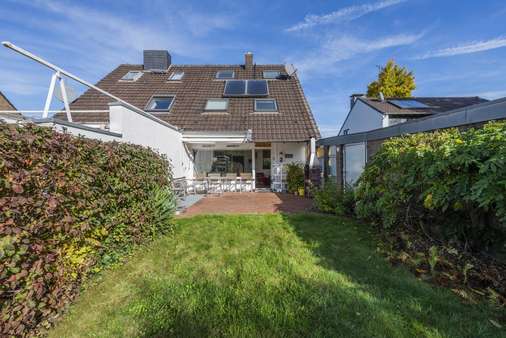 Rückwärtige Ansicht - Doppelhaushälfte in 40668 Meerbusch mit 86m² günstig kaufen