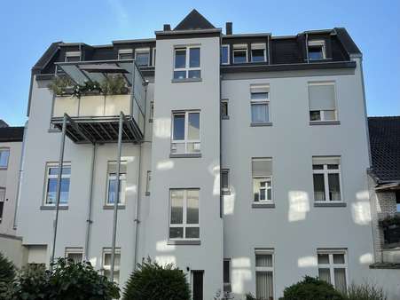 Rückansicht mit Balkon - Etagenwohnung in 41747 Viersen mit 99m² kaufen