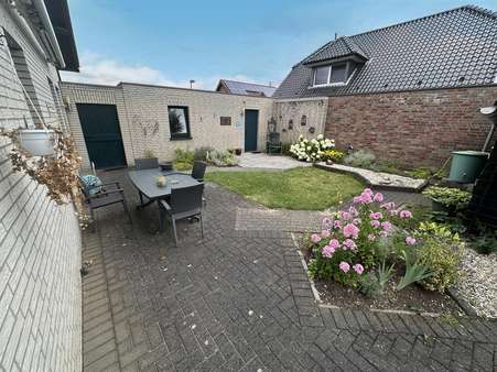 Blick in den Garten - Einfamilienhaus in 47559 Kranenburg mit 118m² kaufen