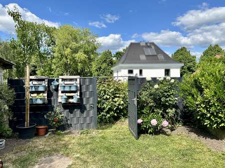 Garten mit Ausgang zum Kattewall - Reihenmittelhaus in 46459 Rees mit 88m² kaufen