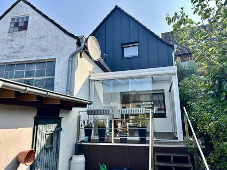 Rückseite mit Terrasse Rückseite mit Terrasse - Reiheneckhaus in 46419 Isselburg mit 166m² kaufen