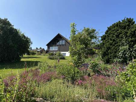 Ein Blumenmeer soweit das Auge reicht Ein Blumenmeer soweit das Auge reicht - Einfamilienhaus in 42553 Velbert mit 160m² kaufen