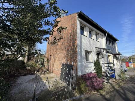 Außenansicht - Doppelhaushälfte in 40724 Hilden mit 85m² kaufen
