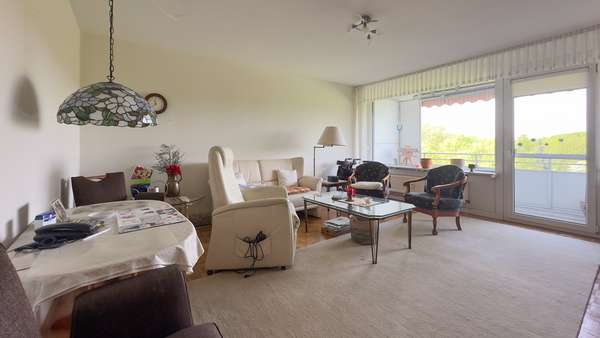 Wohnzimmer - Etagenwohnung in 40880 Ratingen mit 78m² kaufen