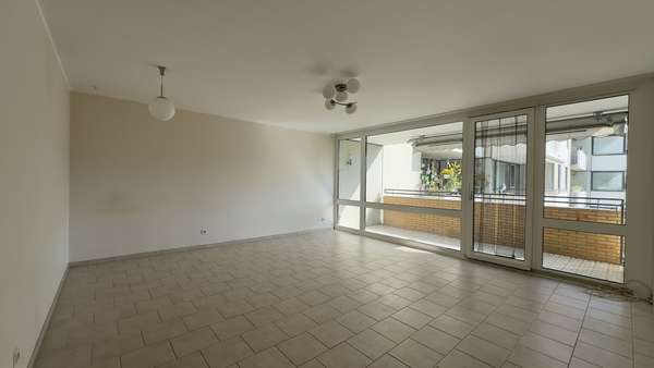 Wohnzimmer - Etagenwohnung in 40880 Ratingen mit 78m² kaufen