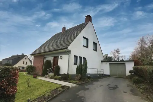 Perfekt für Familien: Ruhig gelegenes Einfamilienhaus mit Garage und Sonnengarten am Bärenloch!