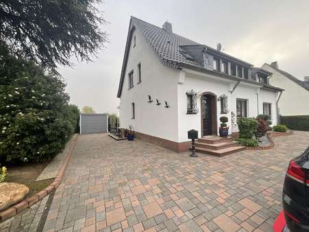 Vorderansicht Vorderansicht - Einfamilienhaus in 47199 Duisburg mit 155m² kaufen